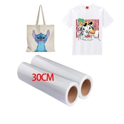 Maksimalkan Potensi Pencetakan Anda dengan Bahan Pencetakan DTF 30cm*100m 75U Release Pet Film Roll Double-sided Cold Peel