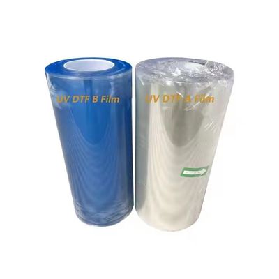 Cold Hot Peel Ab A3 UV DTF Pet Film Roll Transparan DTF Transfer Film 60cm Custom